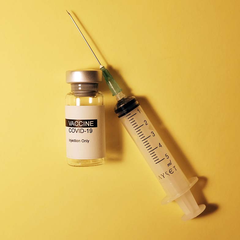 Covid-19 Vaccine with Syringe and Vaccine Bottle