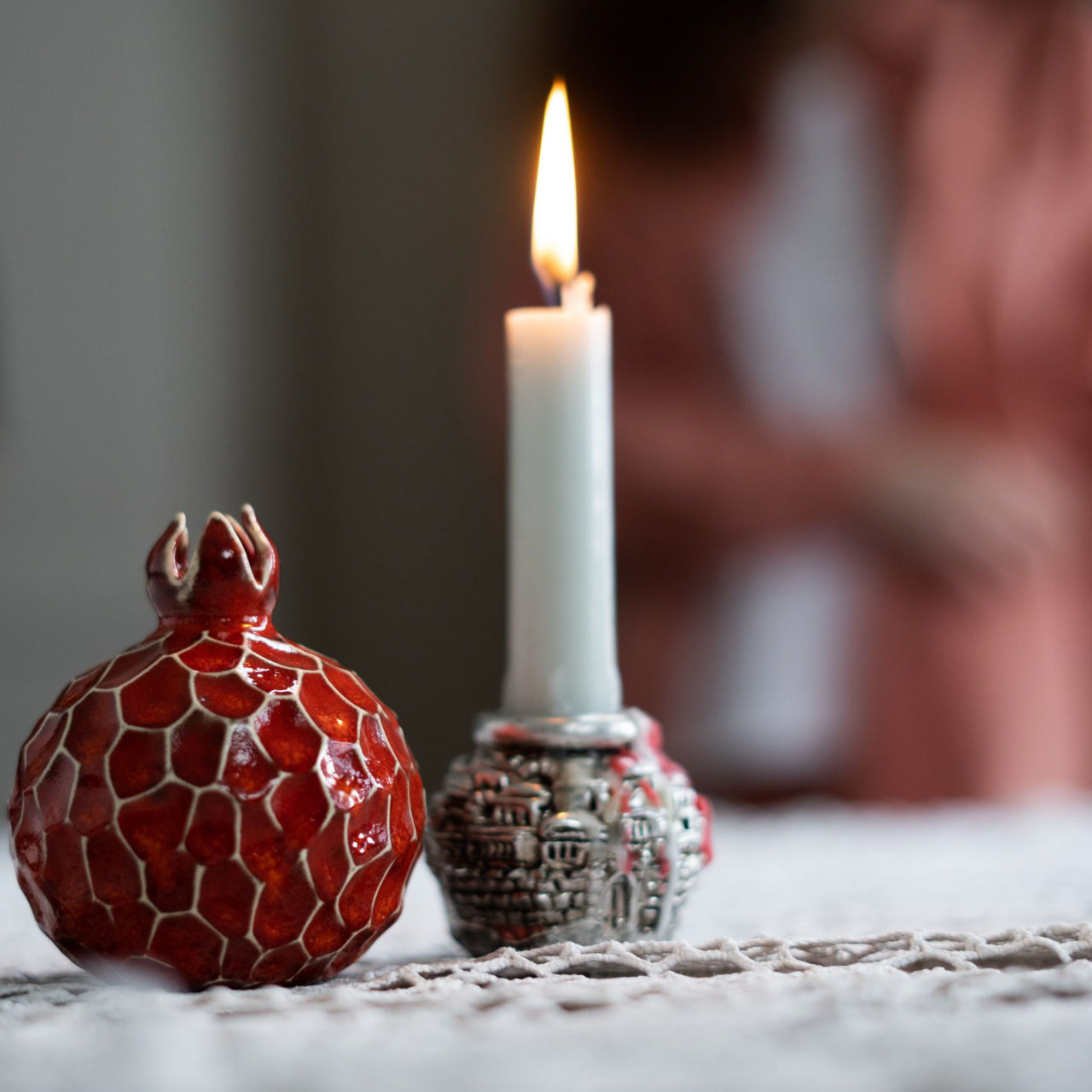 candle on a decorative candle holder