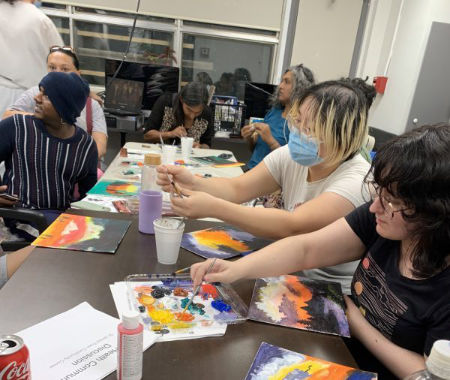 A group of people painting