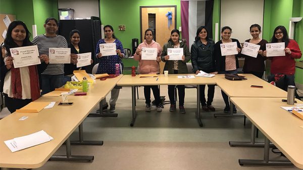 Collective members receiving their Food Handling Certificate